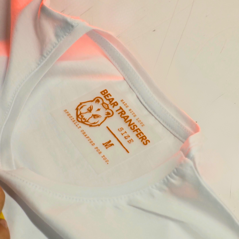 Load image into Gallery viewer, DTF Transfers tag showing size for Bear Transfers on a white t-shirt.