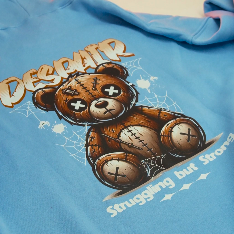 Load image into Gallery viewer, DTF Transfers of a blue hoodie featuring Despair graphic design.