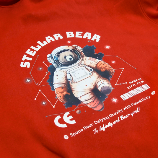 DTF Transfers of a red sweatshirt featuring Stellar Bear astronaut graphic design.